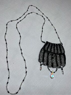 Charming miniature crocheted seed-bead pouch necklace